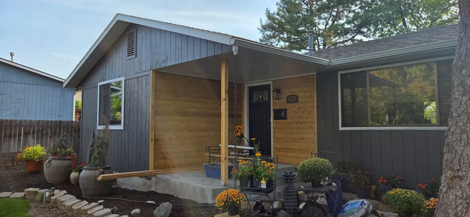 Completed cedar accent siding and porch refresh on Idaho home