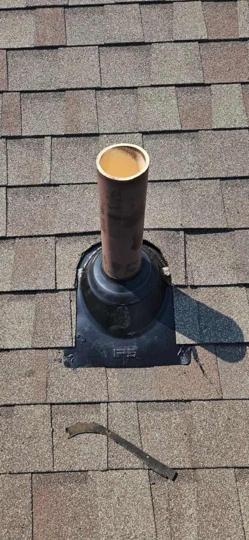 Vent pipe with cracked rubber boot flashing before repair